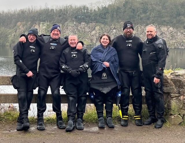 a group of scuba divers who are at cromhall quarry